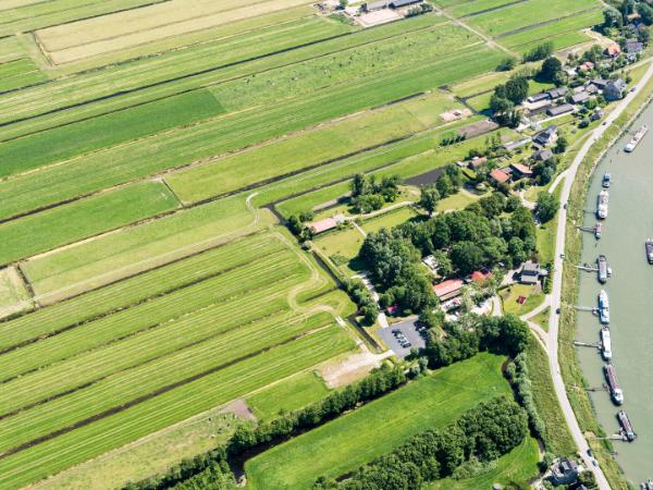 Afbeelding 6 van Leefgoed de Olifant gevestigd in de plaats Nieuwerkerk aan den IJssel in de provincie Zuid-Holland geeft inzicht in de mogelijkheden van de vergaderlocatie.