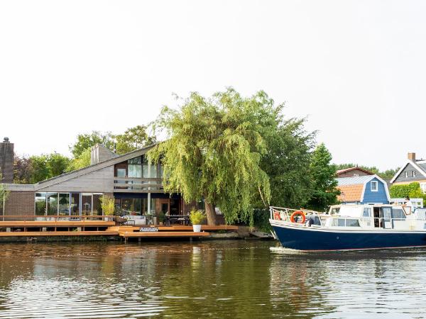 Afbeelding 11 van De Amstel tafel gevestigd in de plaats Ouderkerk aan de Amstel in de provincie Noord-Holland geeft inzicht in de mogelijkheden van de vergaderlocatie.